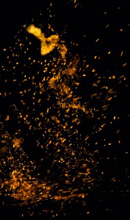 fire flames with sparks on a black backgroundの写真素材