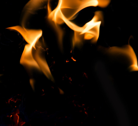Fire flames on a black backgroundの写真素材