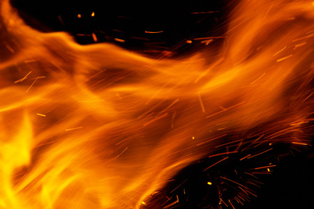 fire flames with sparks on a black background