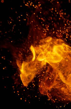 Fire flames on a black backgroundの写真素材