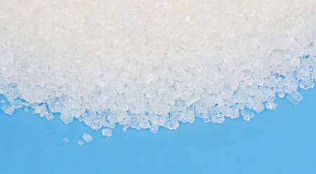 sugar on a blue backgroundの写真素材