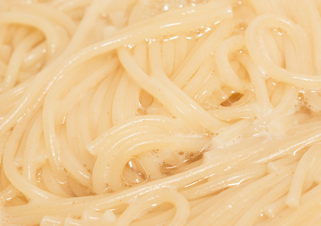 spaghetti boiling in a potの写真素材