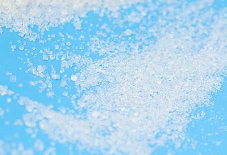 sugar on a blue backgroundの写真素材