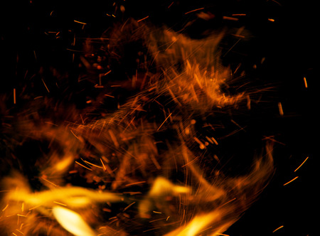 fire flames with sparks on a black backgroundの写真素材