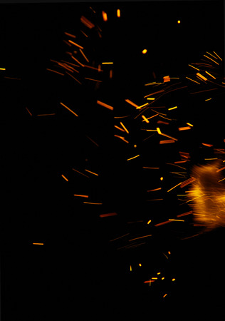fire flames with sparks on a black backgroundの写真素材