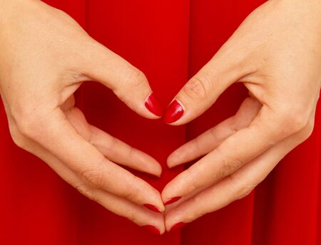 red material in handの写真素材