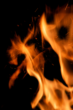 fire flames with sparks on a black background