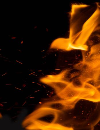fire flames with sparks on a black background