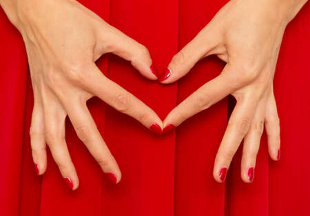 red material in handの写真素材