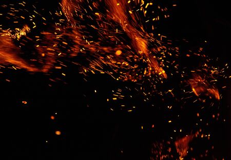 fire flames with sparks on a black background