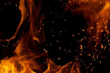 fire flames with sparks on a black backgroundの写真素材