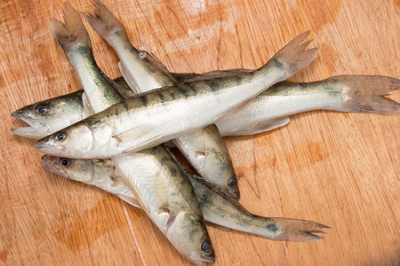 chub fish on a wooden backgroundの写真素材