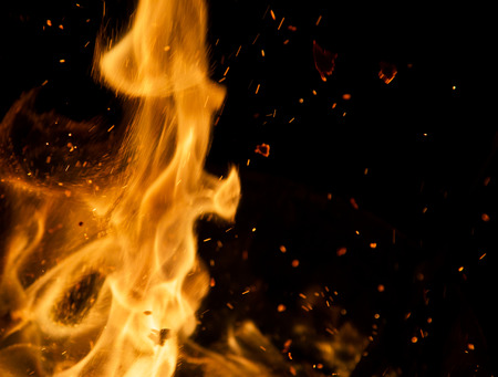 fire flames with sparks on a black backgroundの写真素材
