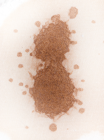 coffee stain on a white materialの写真素材