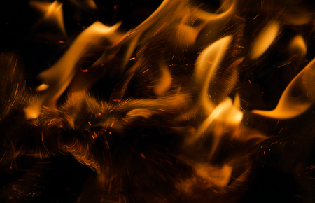 fire flames with sparks on a black backgroundの写真素材