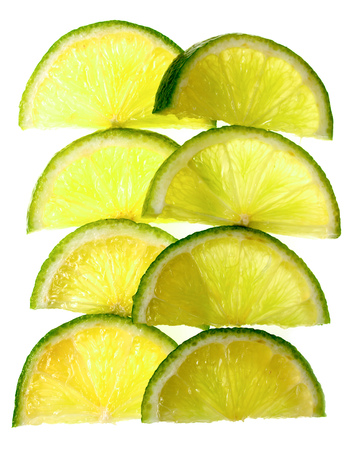 Slices of lime on white background