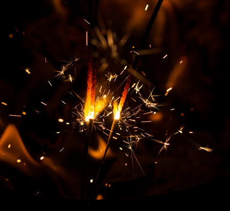 fire flames with sparks on a black background
