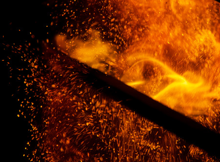fire flames with sparks on a black background