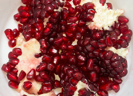 fruit pomegranate on a white backgroundの写真素材