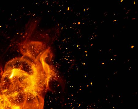 fire flames with sparks on a black backgroundの写真素材