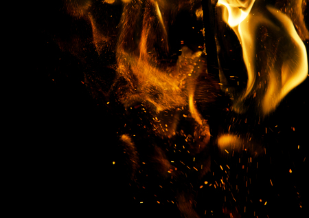 fire flames with sparks on a black backgroundの写真素材