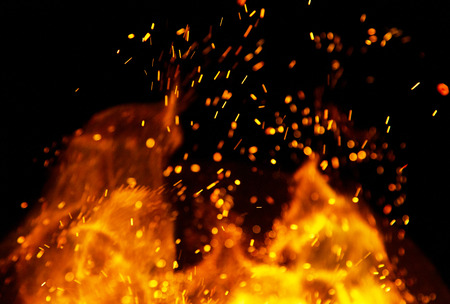 fire flames with sparks on a black background