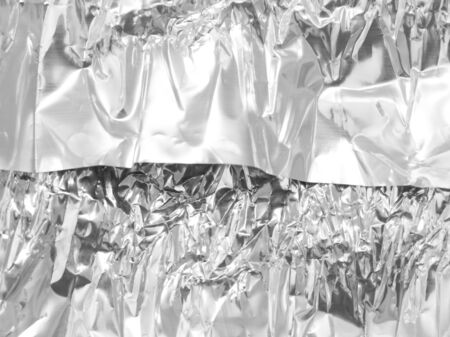 crumpled foil as a backgroundの写真素材