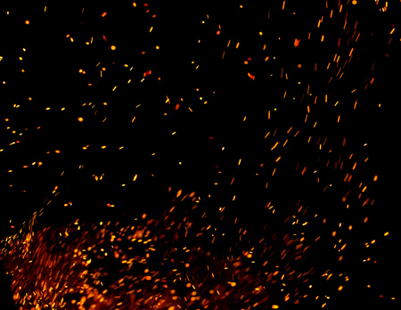 fire flames with sparks on a black backgroundの写真素材
