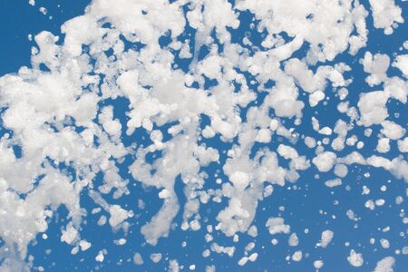 White foam on a blue background