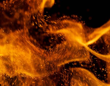 flame of fire with sparks on a black background