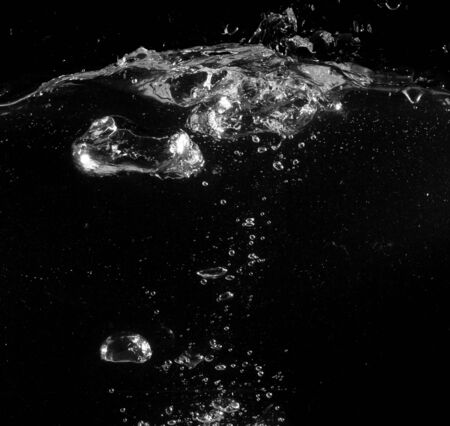 water bubbles on a black backgroundの写真素材