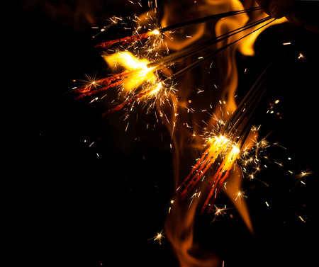 fire flames with sparks on a black background