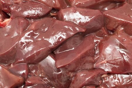 Fresh turkey livers on a white background