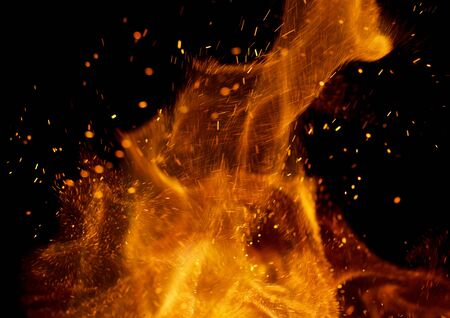 flame of fire with sparks on a black background