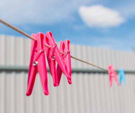 clothes pegs on the rope