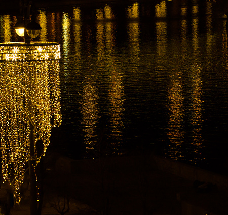 orange blurred lights on a black backgroundの写真素材