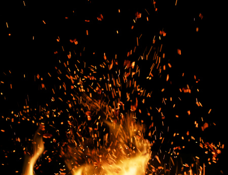 flame of fire with sparks on a black background