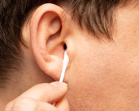 ear cleansing with a stick