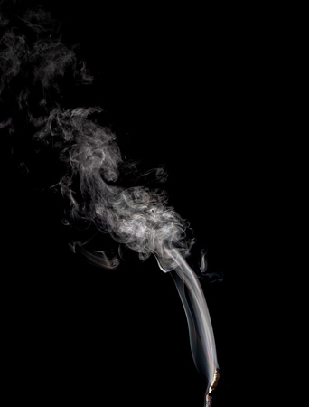 white smoke on black backgroundの写真素材