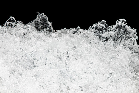 clear ice on black backgroundの写真素材