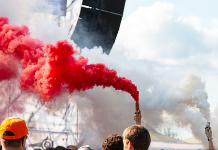 smoke bomb in hand