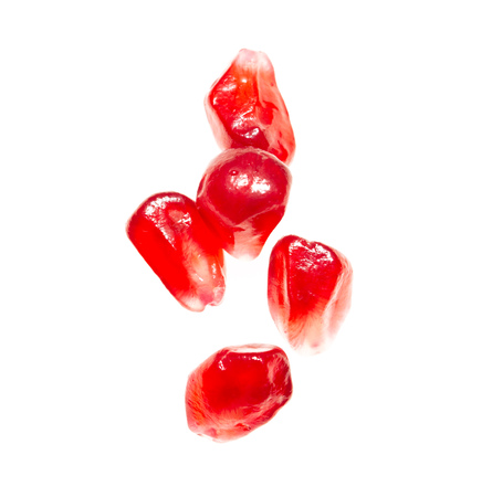 pomegranate seeds on white backgroundの写真素材
