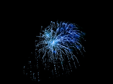 colorful lights from fireworks on a black backgroundの写真素材