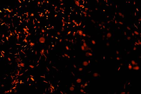 flame of fire with sparks on a black backgroundの写真素材