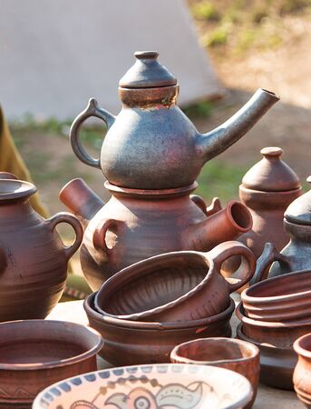 handmade clay dishes of various shapesの写真素材