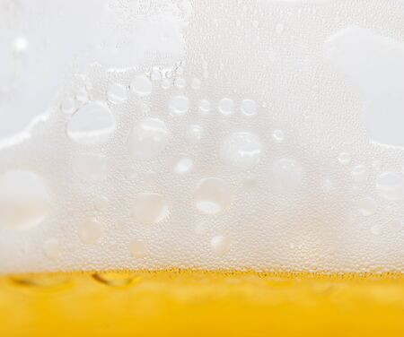 foam with beer bubbles as background