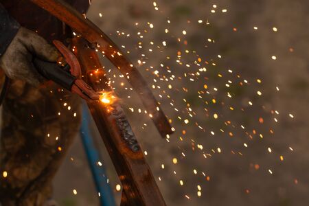 metal welding with sparksの写真素材