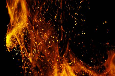 flame of fire with sparks on a black background