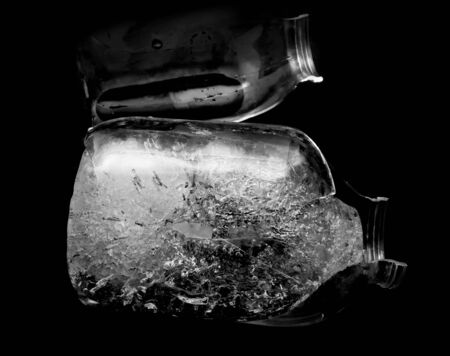 ice with glass on a black background
