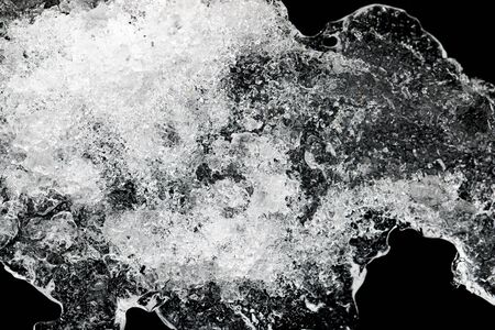 transparent ice crystals on a dark background